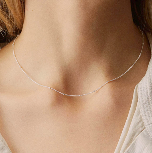 vergoldete Kette mit Zwischenperlen